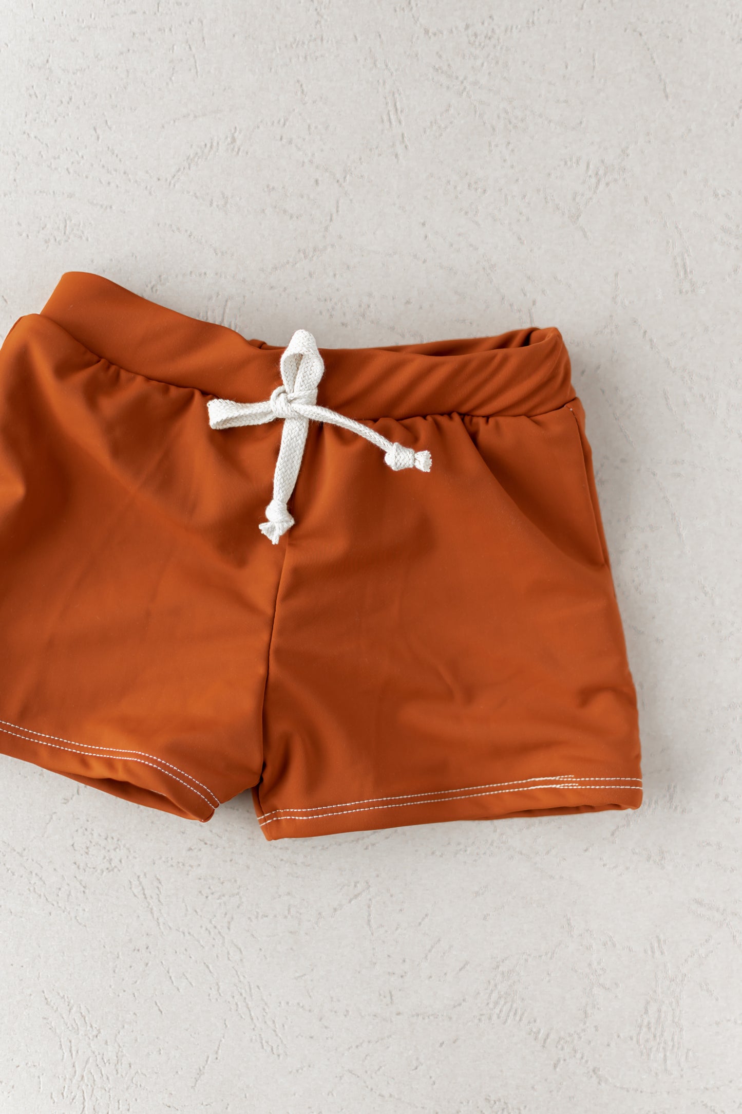 Boy Swim Shorts | European Style Swimwear | Handmade in USA | Rust
